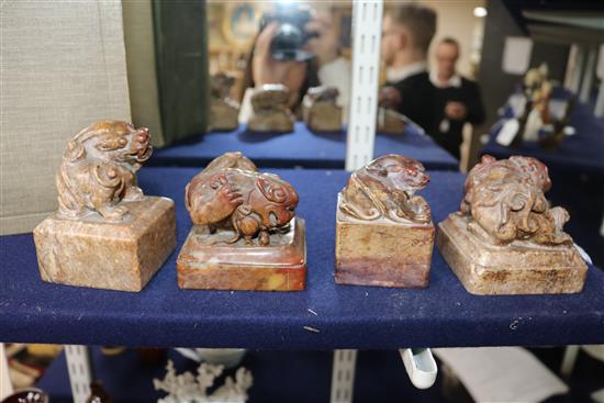 Four Chinese soapstone lion-dog seals